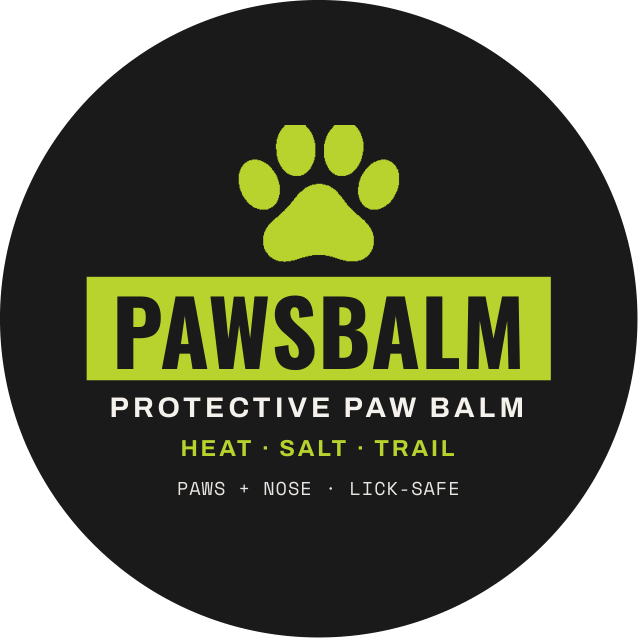 PawsBalm front label: black circle, lime paw print and the words PawsBalm Protective Paw Balm, Heat, Salt, Trail, Paws plus nose, lick-safe